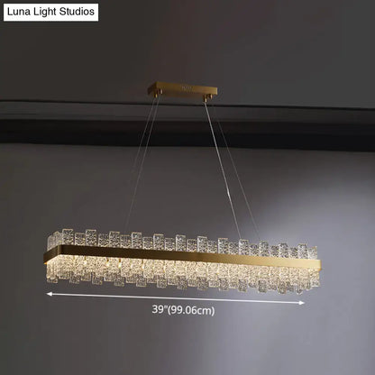 Gold-toned brass plated decorbites modern crystal loop pendant light with cascading clear crystal prisms and led
