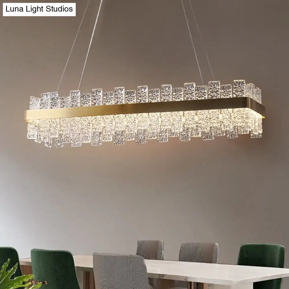 Decorbites modern crystal loop pendant light with brass plated frame and cascading clear crystal elements