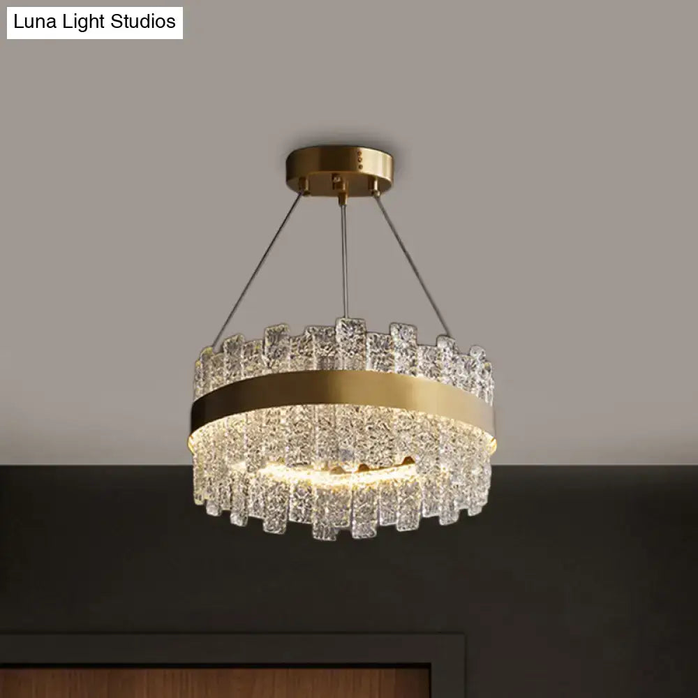 Decorbites™ modern crystal loop pendant light with brass plated circular bands and clear glass tiers for elegant lighting