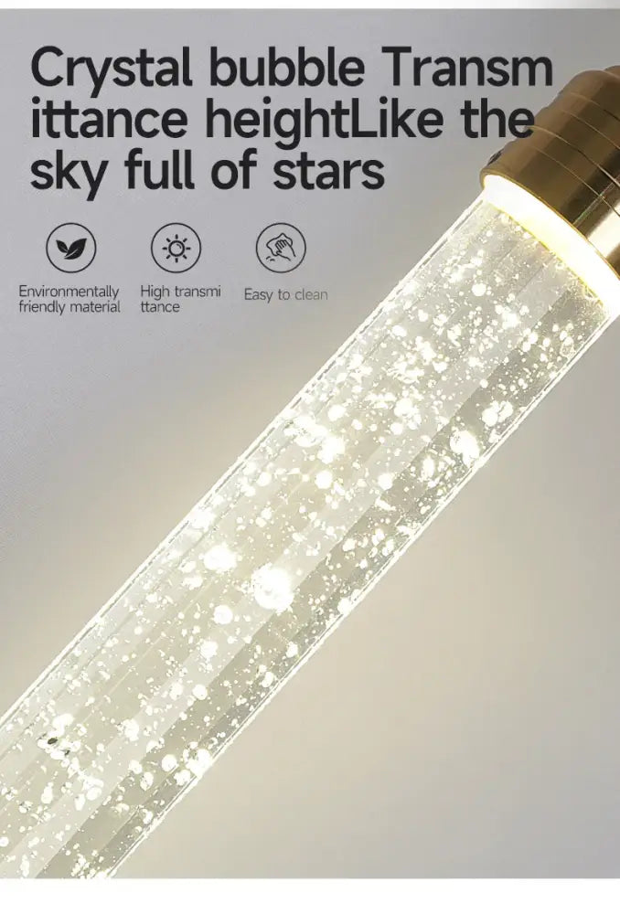DecorBites modern crystal pendant light with translucent cylindrical design, glowing bubbles, and gold fixtures