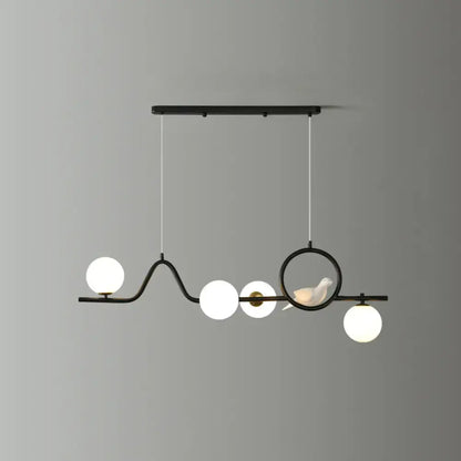 Decorbites™ modern curve island ceiling light with black metal pendant, four white glass ball bulbs, and bird accent for dining room