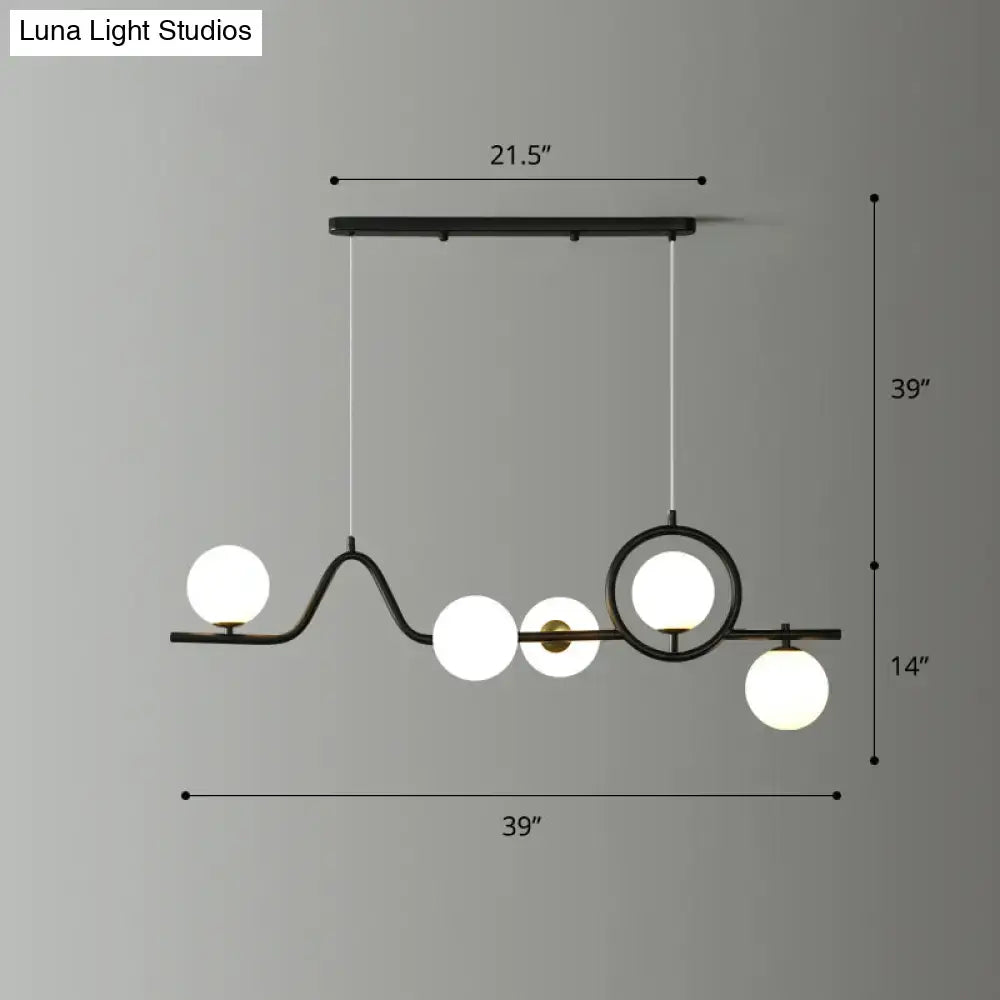 Modern black metal curve island ceiling light with five frosted glass globes for dining room by DecorBites™