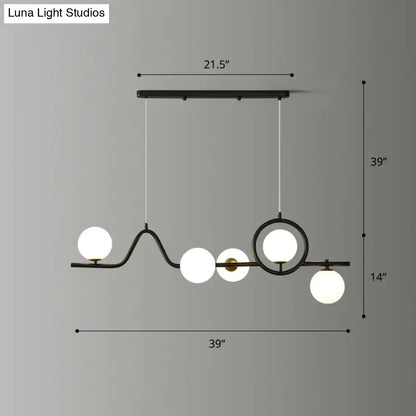 Modern black metal curve island ceiling light with five frosted glass globes for dining room by DecorBites™