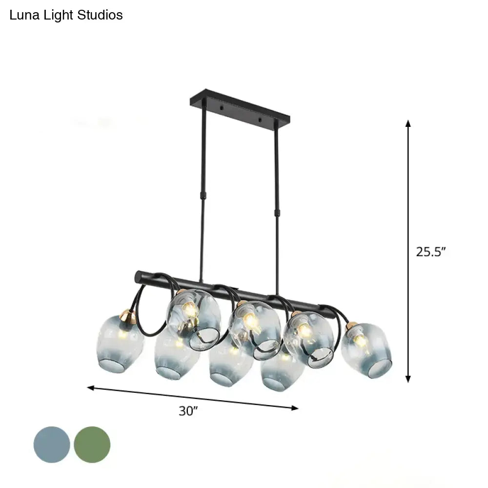 DecorBites modern black metal island light with five frosted glass globes in a linear wine cup island light design