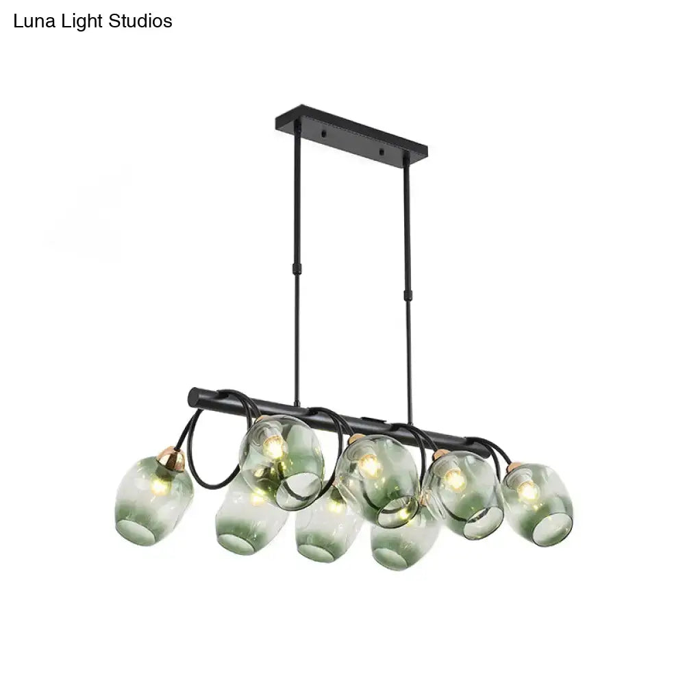 DecorBites modern black metal island light with five translucent green glass globe shades wine cup island light