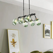 Modern green gradient glass wine cup island light with black metal frame and gold accents by decorbites