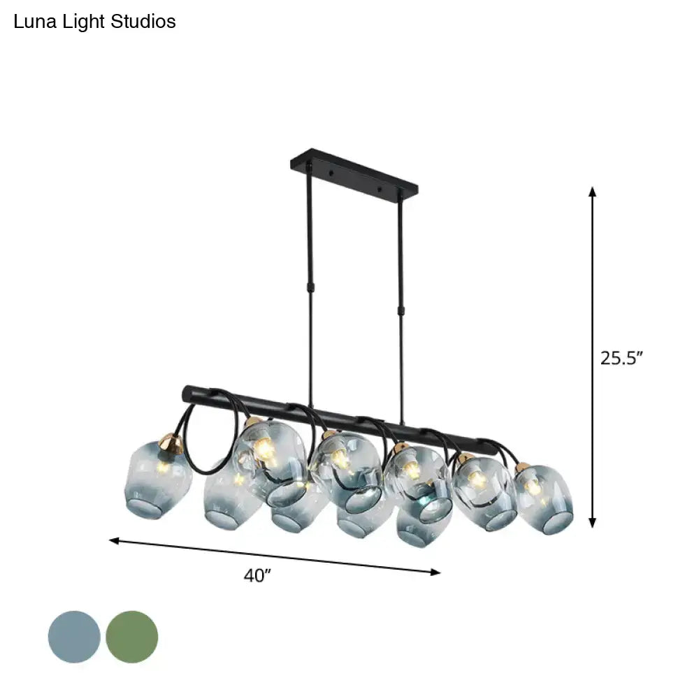 Modern black metal chandelier with six frosted glass globes designed as a cup island light for elegant island lighting