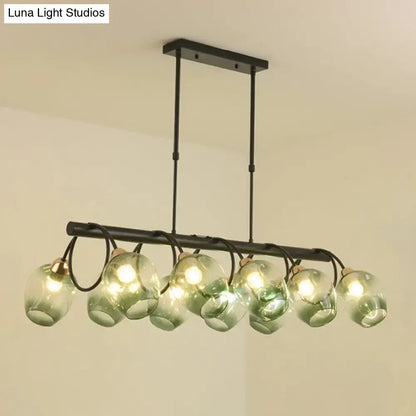 DecorBites modern black metal wine cup island light with six translucent green glass globe shades for cup island lighting