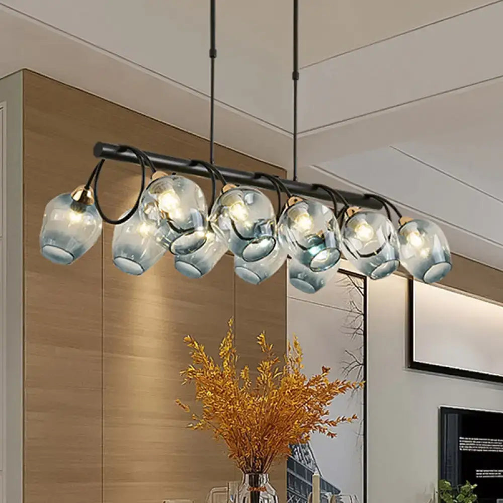 DecorBites™ modern blue-tinted dimpled glass wine cup island light with sleek black metal frame suspended fixture