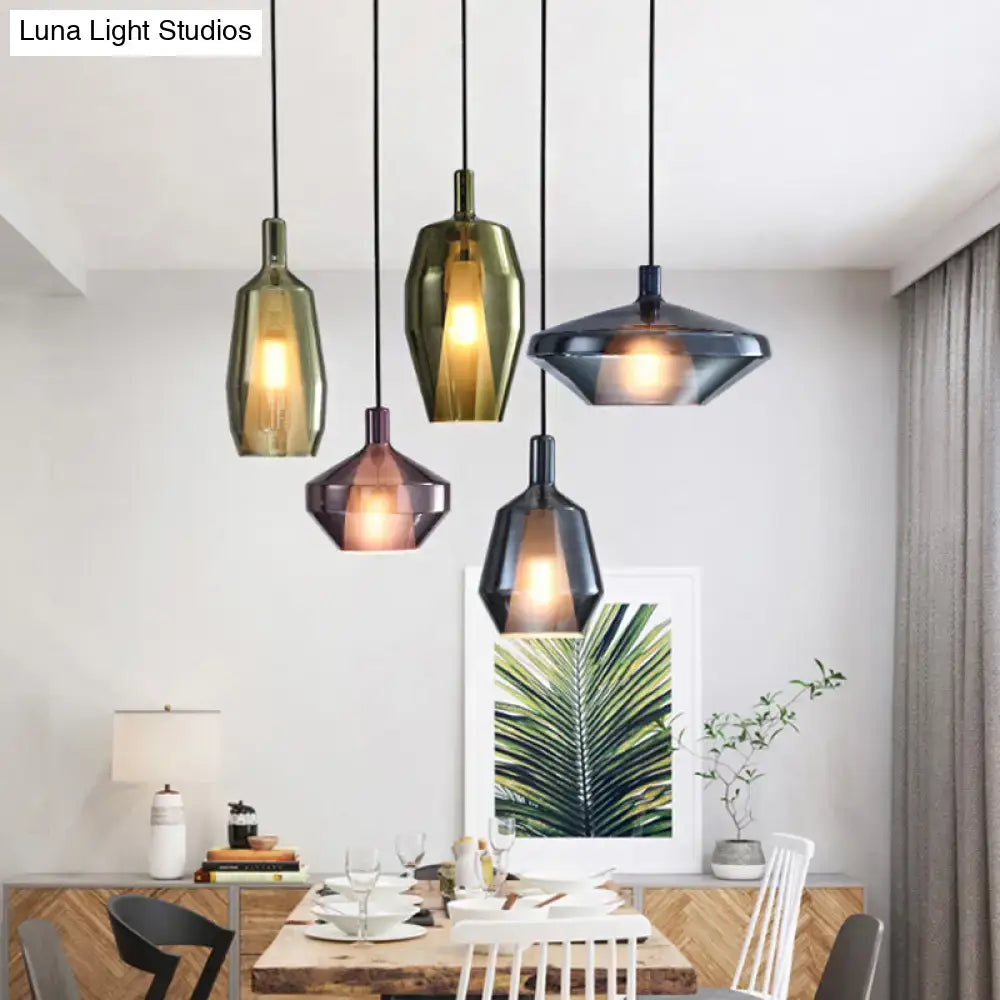 Decorbites modern dining room pendant light fixture with geometric glass shades in amber olive green and dark gray hues hanging on black cords with fixture width and height details