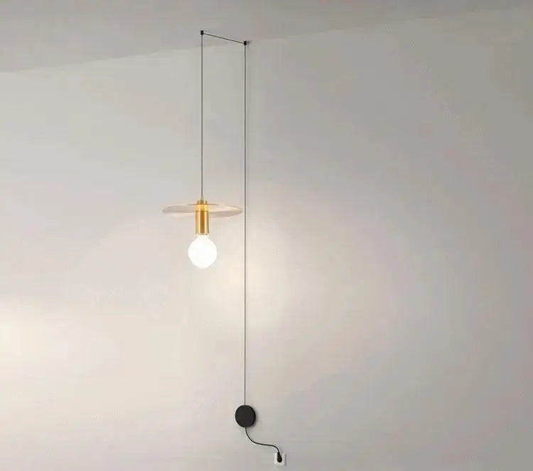 DecorBites modern diy pendant light with gold-toned cylindrical fixture, clear glass disc shade, and black cord