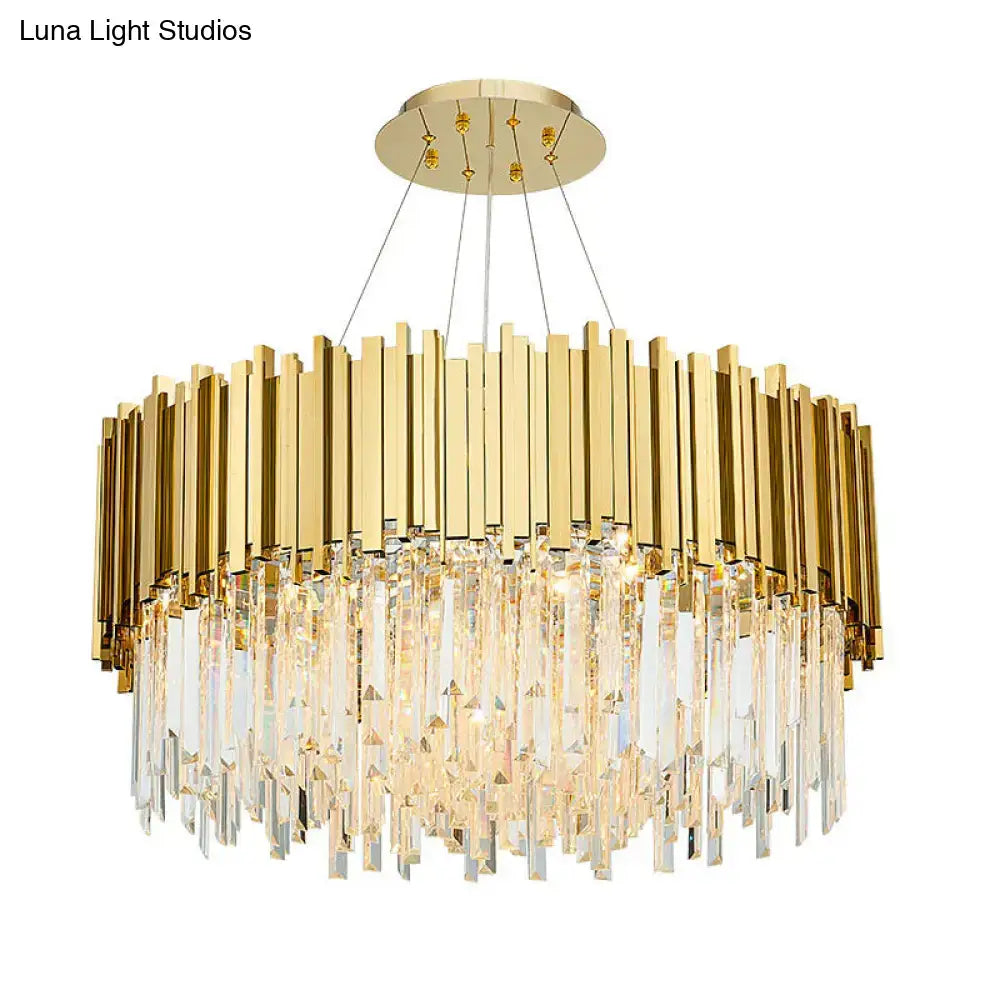 Gold-toned DecorBites™ crystal prism chandelier with vertical brass bars and cascading prisms for living room island lighting