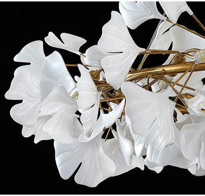 Elegant white porcelain ginkgo leaf chandelier with gold-toned metal branches for dining room lighting decorbites modern ginkgo led chandeliers