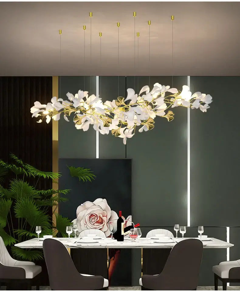 Elegant white and gold DecorBites™ modern ginkgo leaf LED chandelier with floral design for dining room lighting