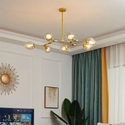Gold-toned DecorBites™ modern glass ball led chandelier with six clear glass globe bulbs for home decor