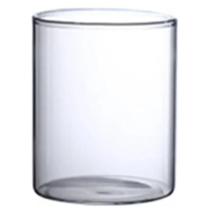 Clear glass hydroponic vase with smooth cylindrical shape and rounded rim for modern wedding decor by decorbites