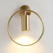 DecorBites™ modern black gold wall sconce with brass-finished circular base and cylindrical wall lamp fixture