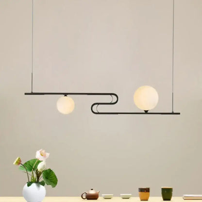 Modern black metal hanging chandelier with two frosted glass globes by decorbites simplicity modo for dining hall island