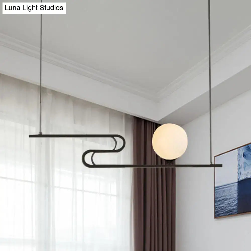 Modern black metal hanging chandelier with spherical frosted glass bulb from DecorBites simplicity modo collection