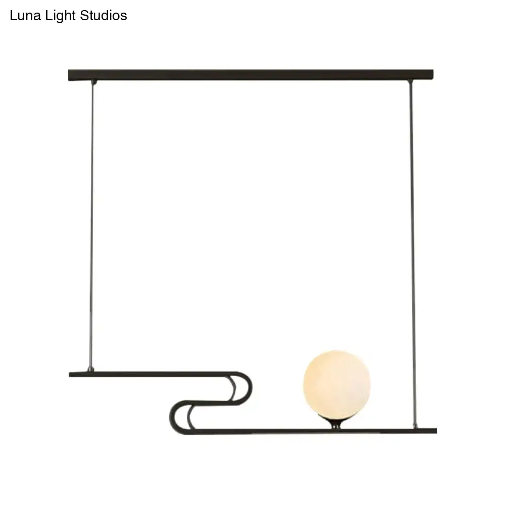 Black metal hanging chandelier with milky glass globe and curved arm from decorbites simplicity modo for dining hall island