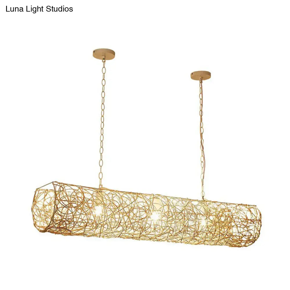 Gold-toned cylindrical pendant ceiling light with woven wire design and chain suspension for tea room island décor