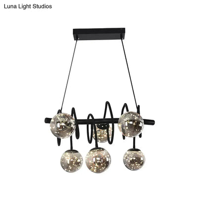 DecorBites™ modern island pendant light with black metal frame and smoke gray glass shade in spiral design with five LED globes