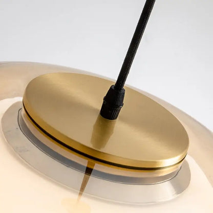 DecorBites™ modern jelly globe pendant light with gold-toned metal base and clear glass globe pendant light shade
