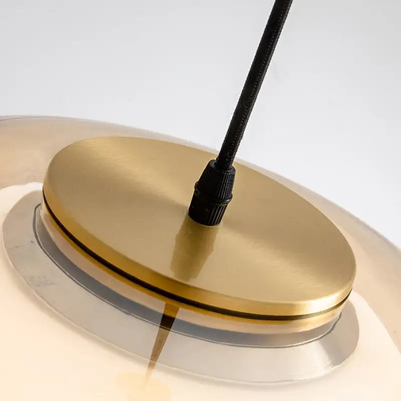 DecorBites™ modern jelly globe pendant light with gold-toned metal base and clear glass globe pendant light shade