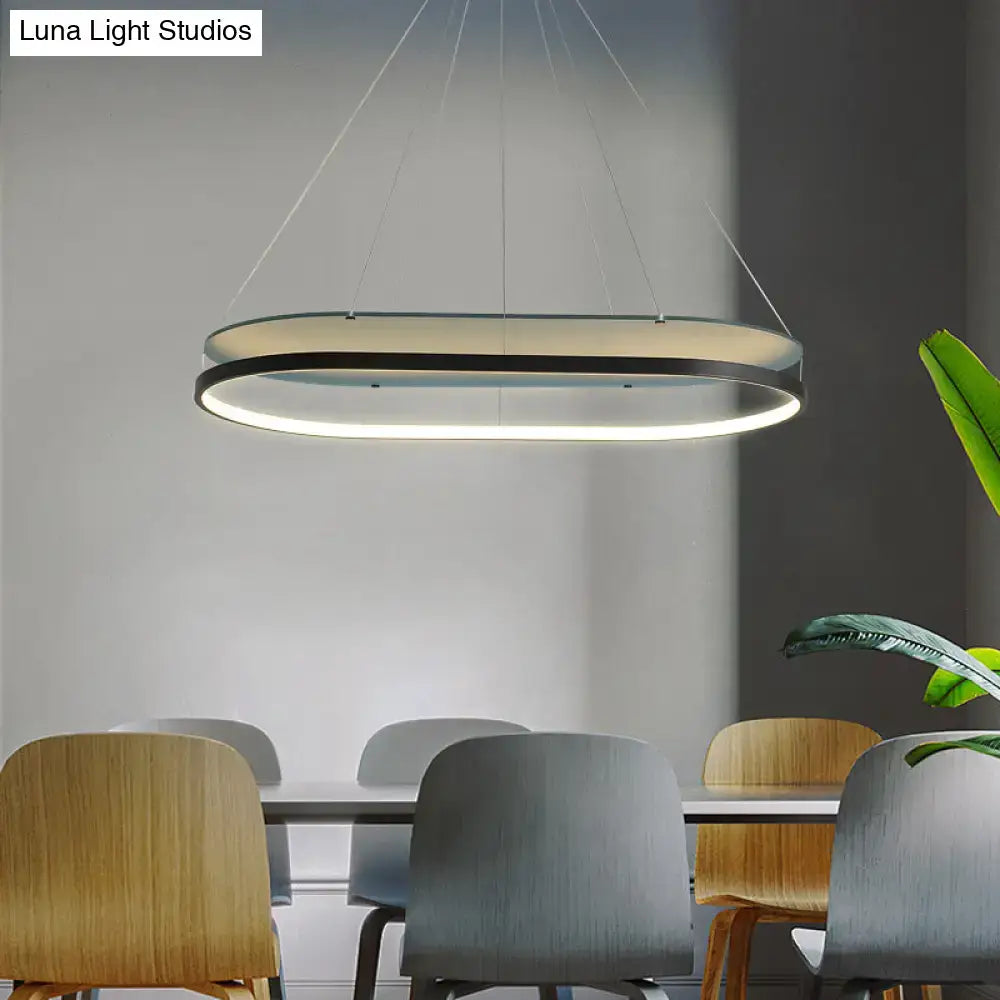 Decorbites modern led acrylic dual oval pendant chandelier in black gold with warm white light for dining room