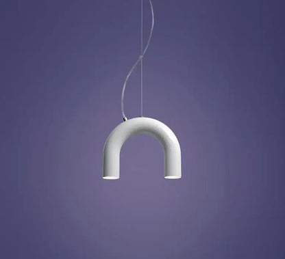 A sleek white u-shaped decorbites modern led arch chandelier with glossy finish and thin cord suspension