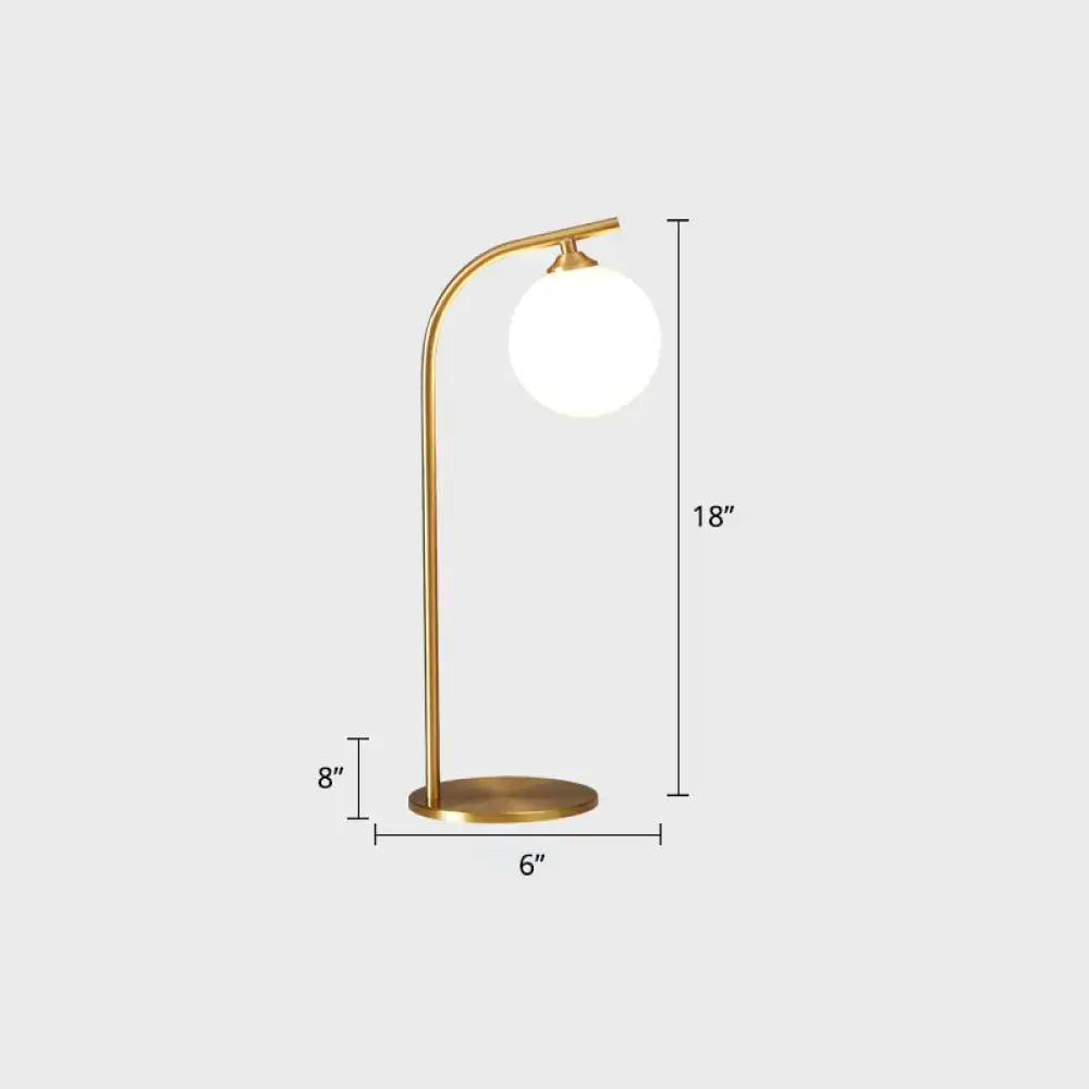 Gold-finished metal table lamp with spherical white glass shade for living room bend metallic nightstand lighting
