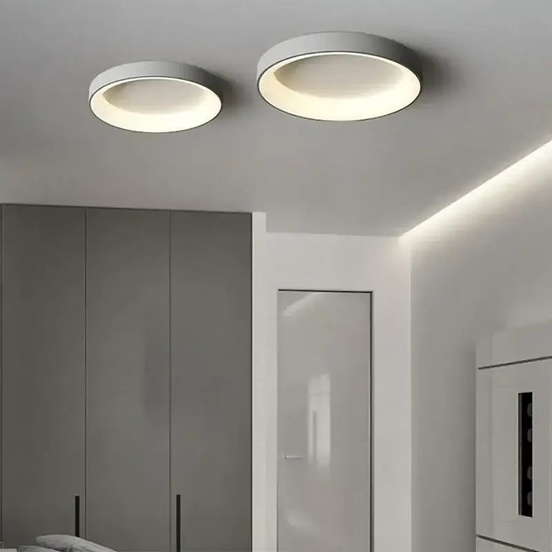 Two decorbites™ modern led ceiling lights with sleek white finish and soft glowing illumination for indoor use