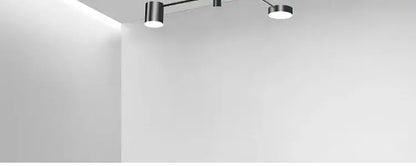 DecorBites™ modern led chandelier with three chrome lights on a slim black arm for living room and bedroom use