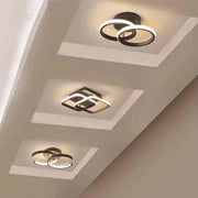 DecorBites™ modern black and white led chandelier with sleek geometric designs and three color options for home use