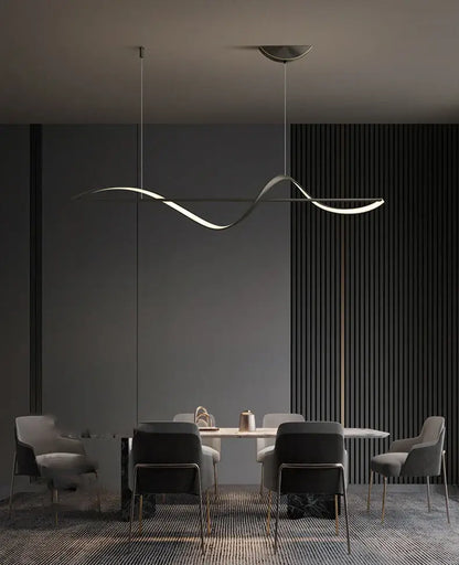 A sleek metallic pendant light with wave design from DecorBites™ modern led chandeliers for dining or bedroom