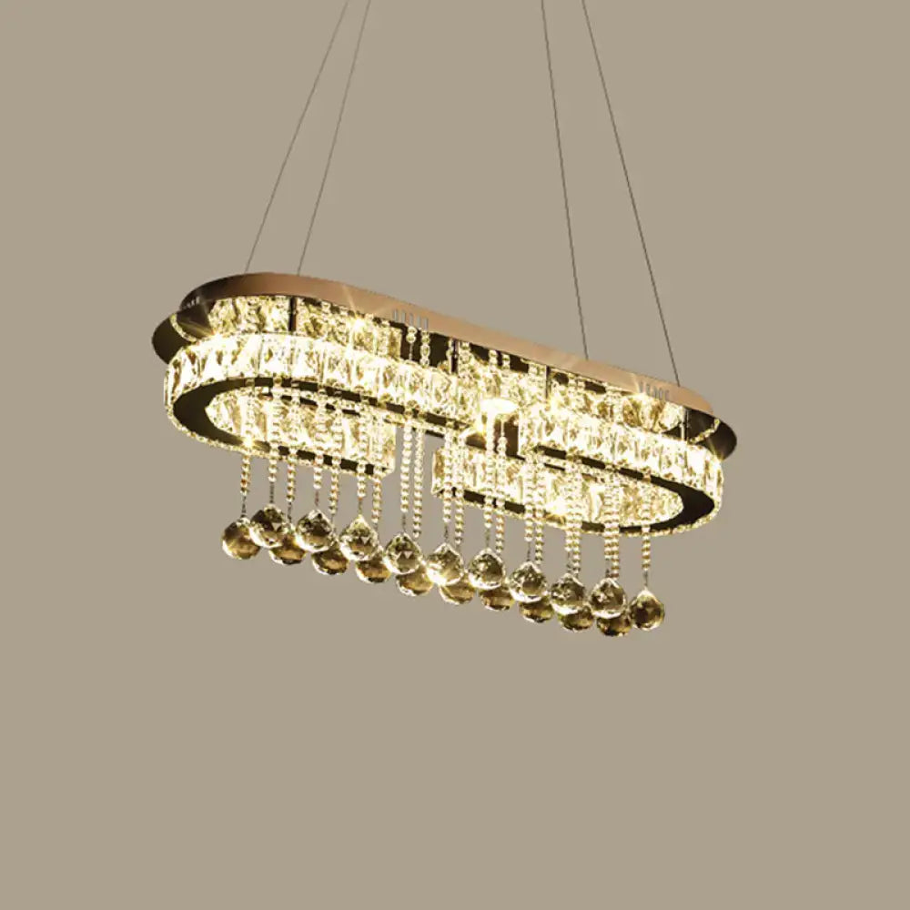Gold-toned modern led crystal pendant light with stainless steel frame and two tiers of faceted and teardrop crystals