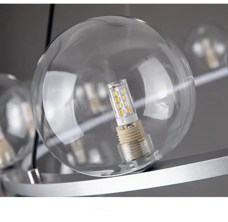 Decorbites™ modern led glass chandelier featuring a clear glass bubble globe with visible leds and an adjustable cord