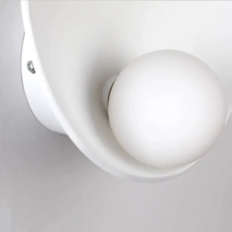 Decorbites™ modern led wall lights featuring a white spherical frosted glass bulb within a white curved housing
