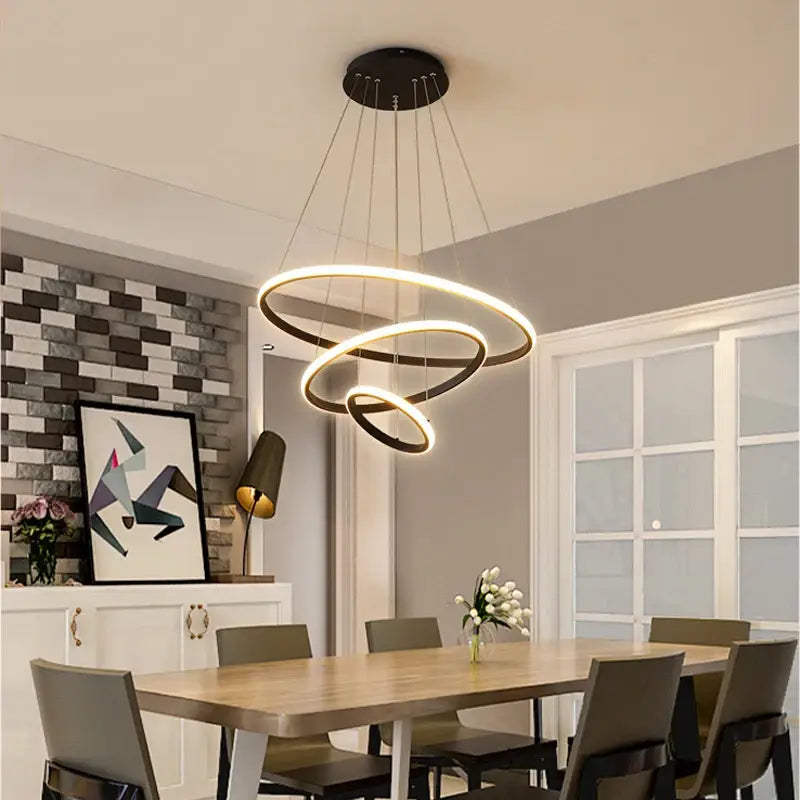 Decorbites modern black and gold pendant lamp with dimmable brightness and warm white illuminated spiral rings
