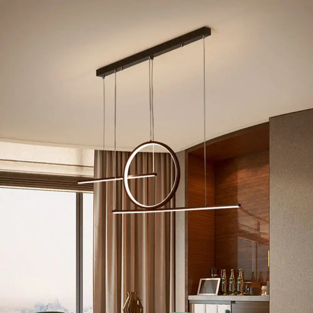 DecorBites™ modern black and gold ceiling light with geometric metal shade emits warm white light for restaurant island use