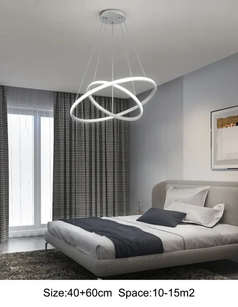 Modern white led chandelier with interlocking circular rings featuring dimmable brightness pendant lamp in warm white