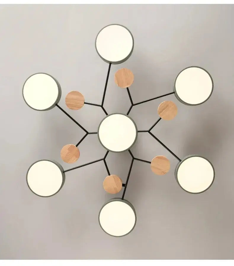 Modern macaron ceiling chandelier by decorbites with 3-color dimming features black metal arms and wooden accents