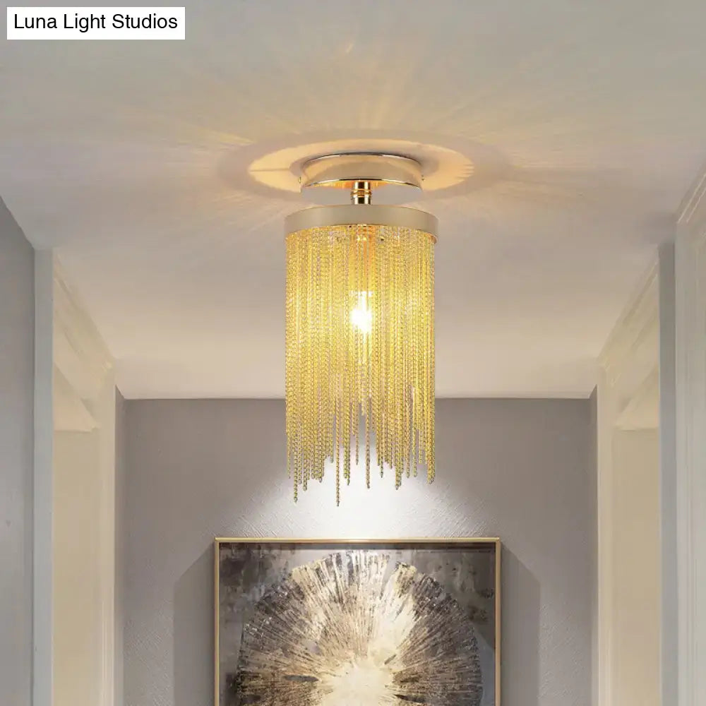 Gold-toned decorbites™ semi flush mount lamp with cascading crystal chains for modern living room lighting