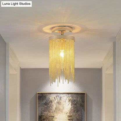 Gold-toned decorbites™ semi flush mount lamp with cascading crystal chains for modern living room lighting