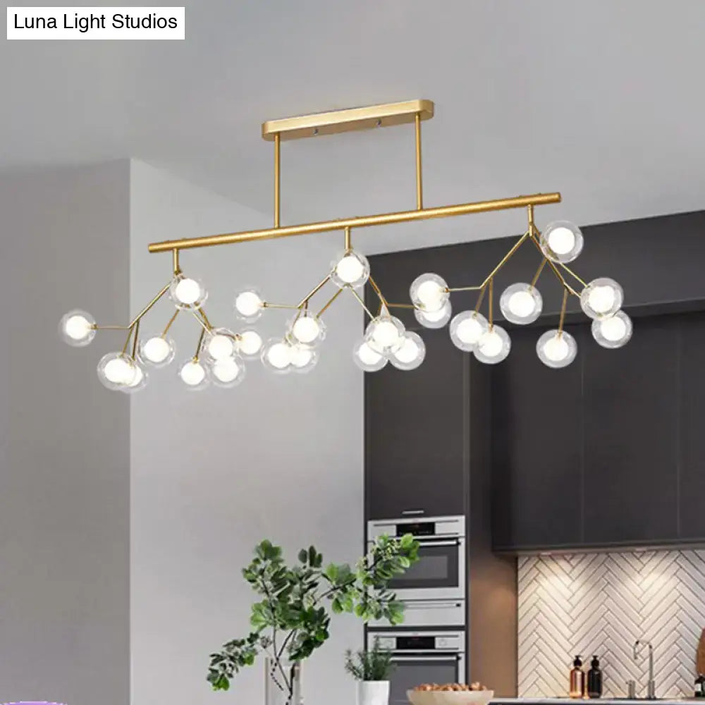 Decorbites modern metal linear island light with gold-toned metal linear frame and clear glass globe bulbs branching design