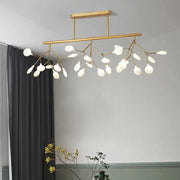 Gold-toned metal linear island light with branching arms and frosted glass globe LED pendant fixture by DecorBites