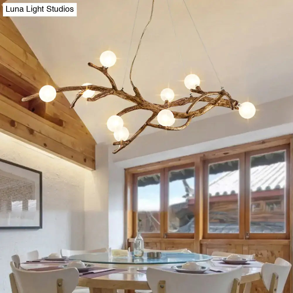 Rustic bronze metal tree branch chandelier with white acrylic ball shades for tree branch island lighting in art deco style