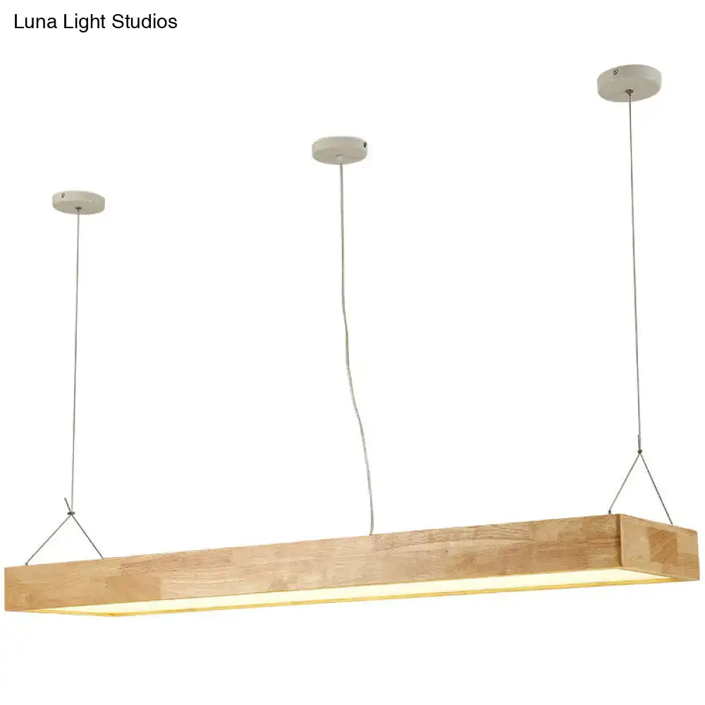 DecorBites modern minimalist beige wood led island pendant lighting with three cords emitting warm illumination