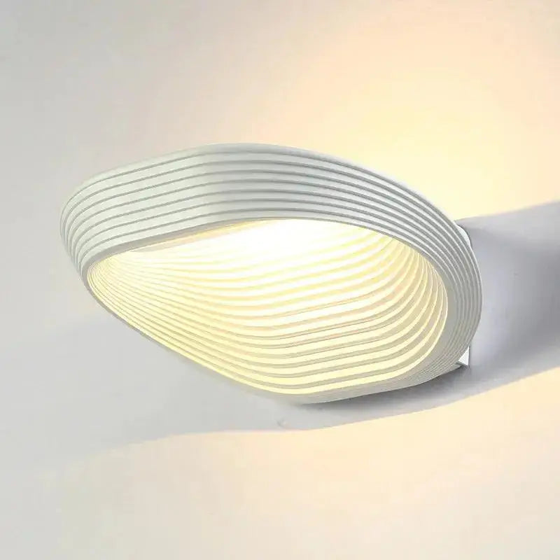 DecorBites™ modern minimalistic wall sconces with sleek white wall-mounted lamp featuring curved concentric ridges