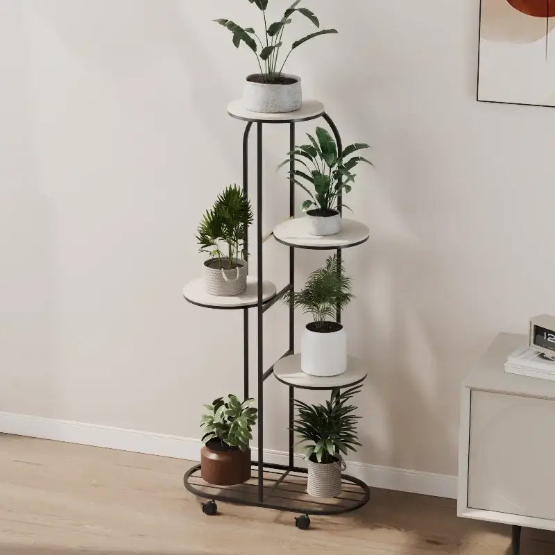 Black metal plant stand with five white circular shelves and caster wheels for interior decor and flower rack use